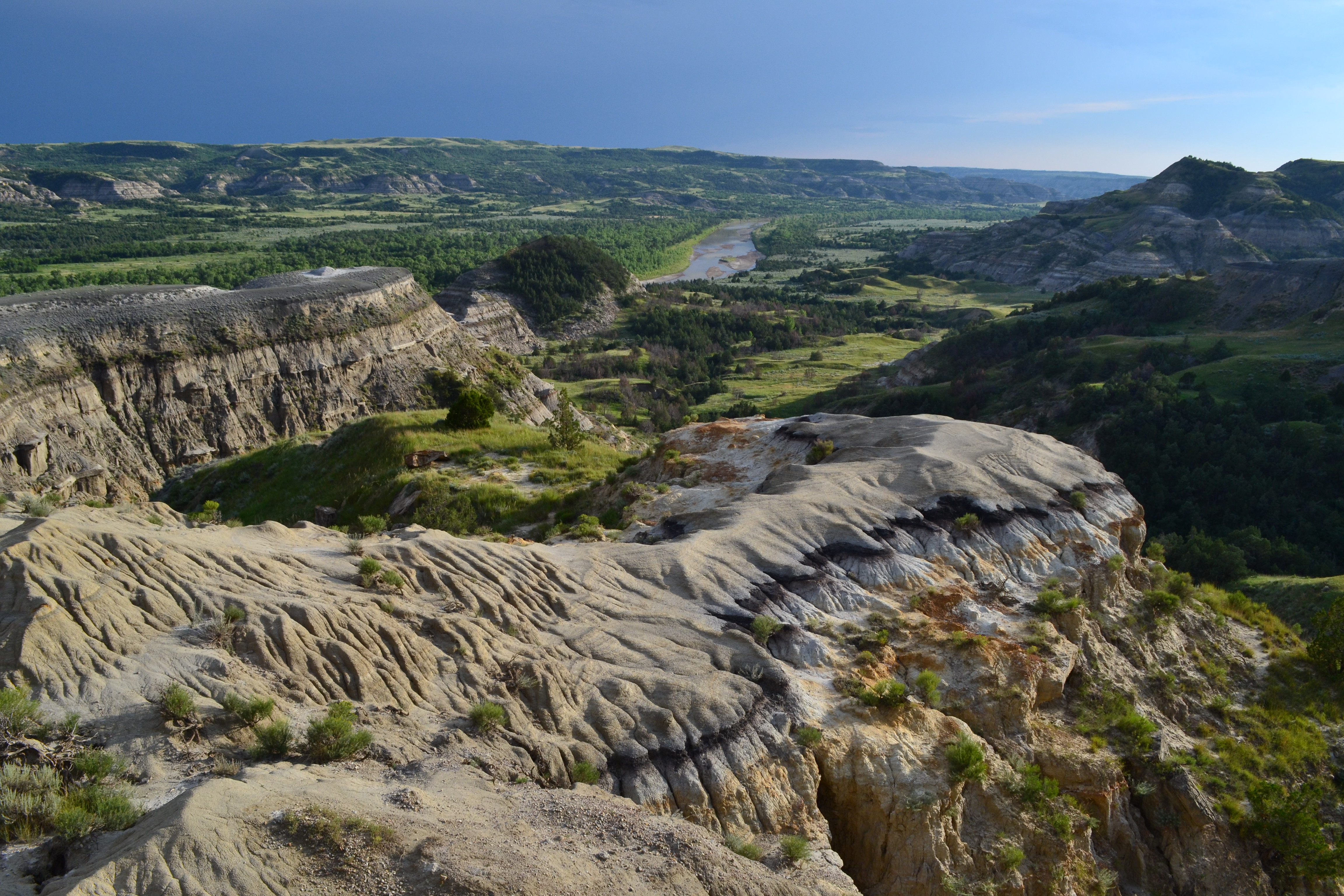 Badlands buttes and prairie beside a hiking trail in Theodore Roosevelt National Park, North Dakota