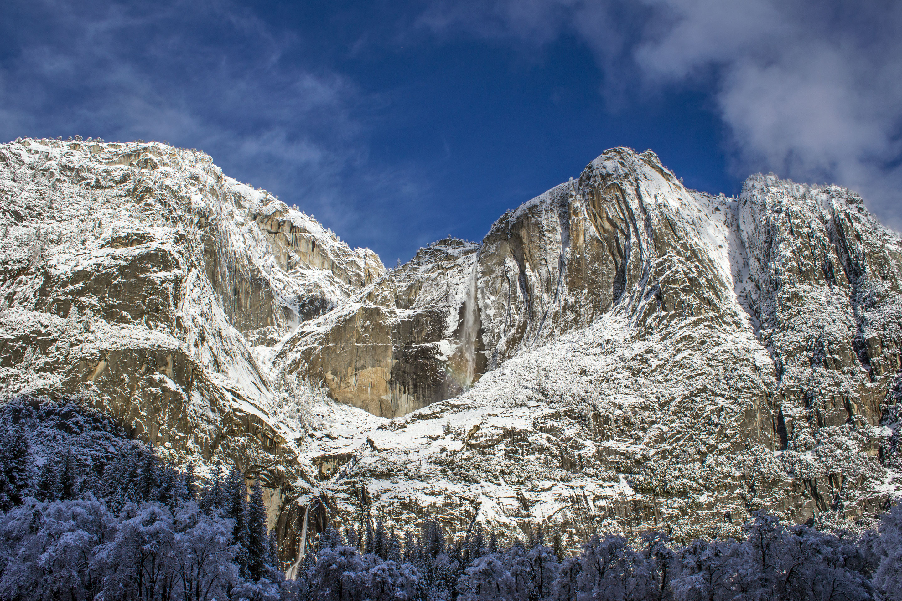 Granite cliffs and waterfalls of Yosemite Valley, a top national park for first-timers, California